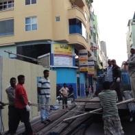 2. Bangladeshi construction workers unloading materials from a lorry in Majeedhi Magu of Male’. Since the year 2000, construction industry has progressed significantly in Maldives while the majority of employees in the industry are Bangladeshi nationals.